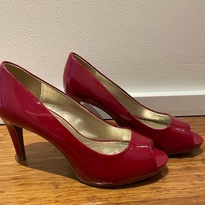 Red patent peep toe heels